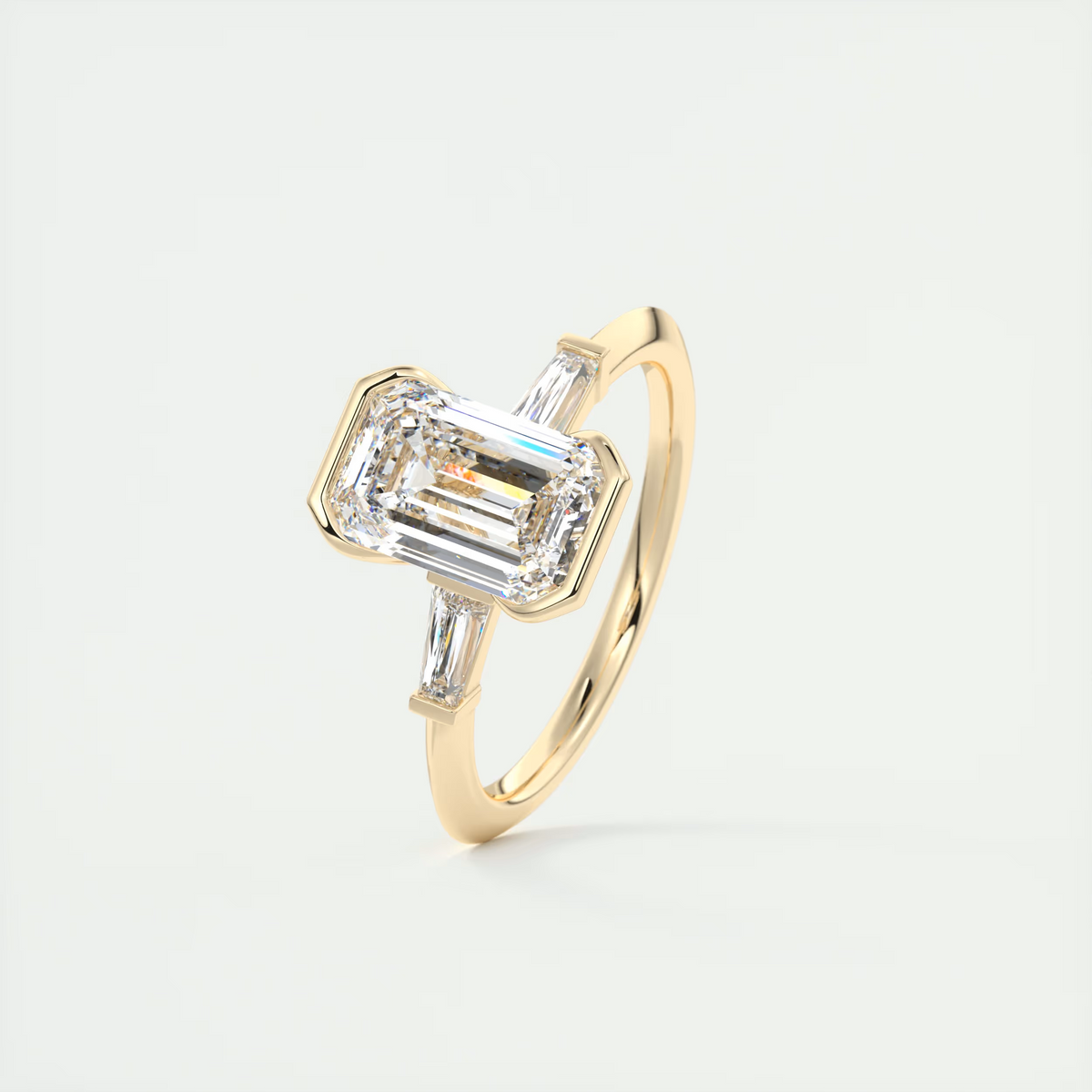 2 Carat Emerald Cut Half Bezel Three-Stone Engagement Ring