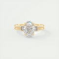 2 Carat Oval Three-Stone Engagement Ring with Tapered Baguettes