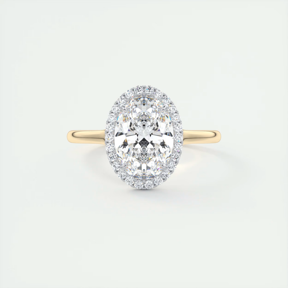 Slim 2 Carat Oval Center with French Set Halo
