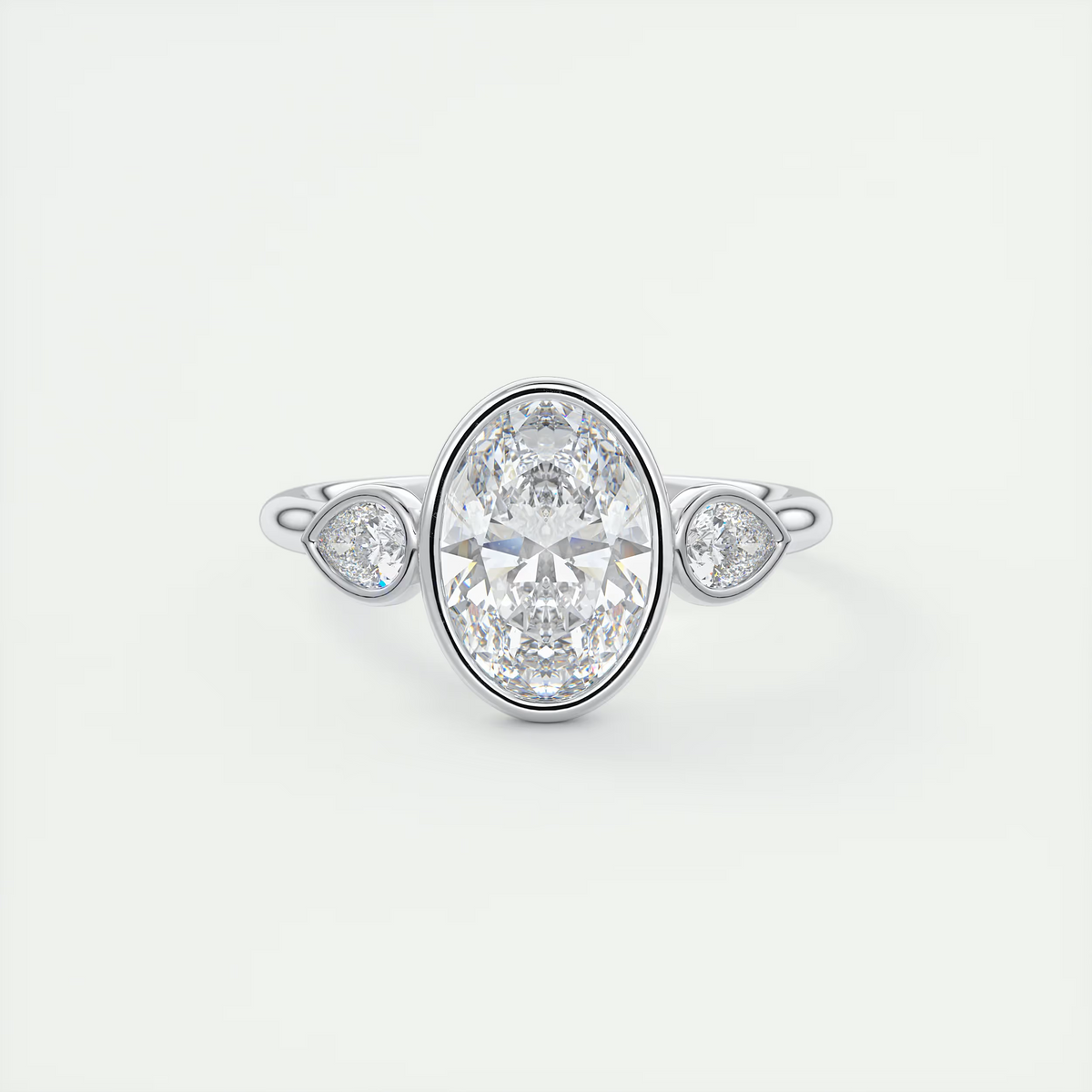 2 Carat Oval Bezel Set Three-Stone Engagement Ring - White Gold