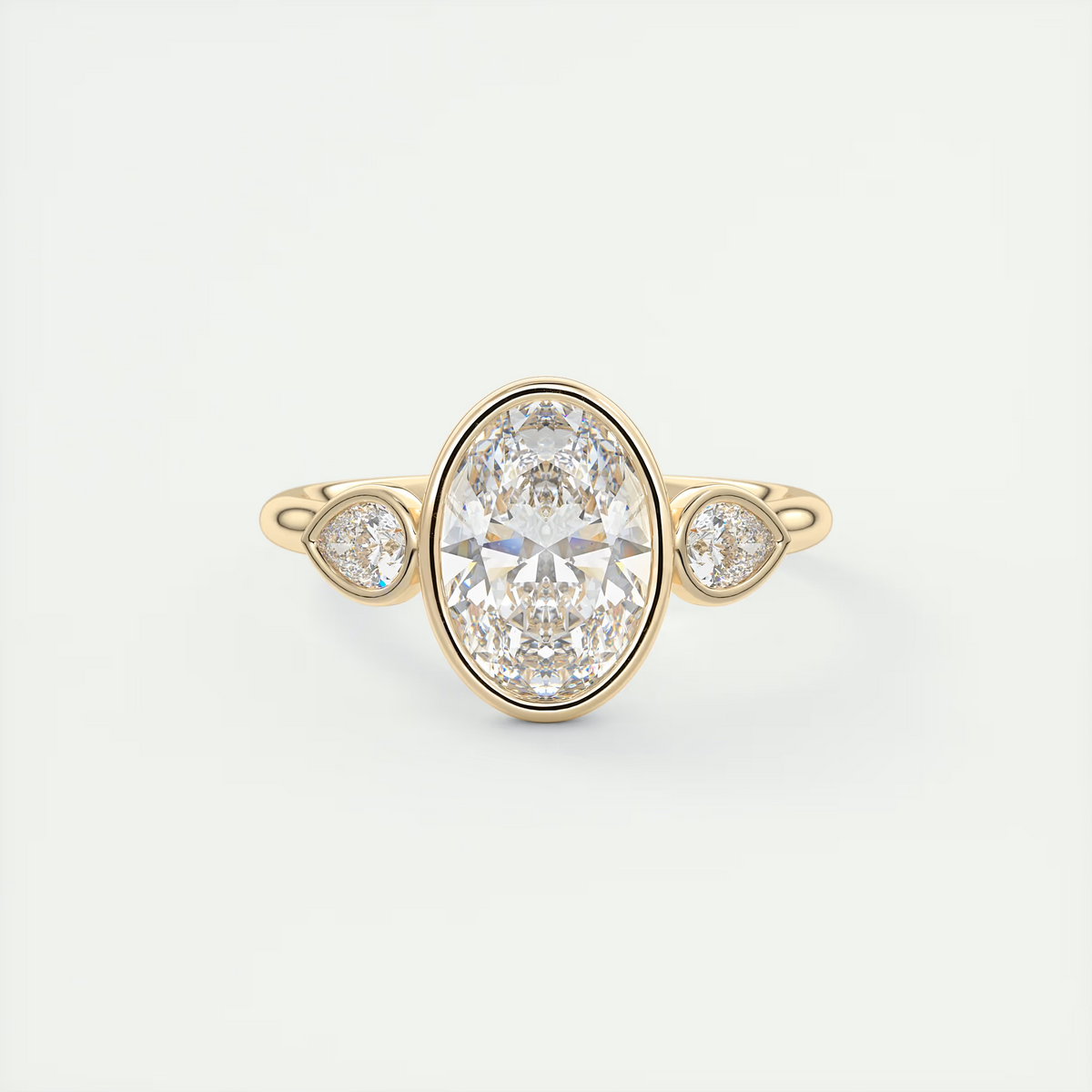 2 Carat Oval Bezel Set Three-Stone Engagement Ring