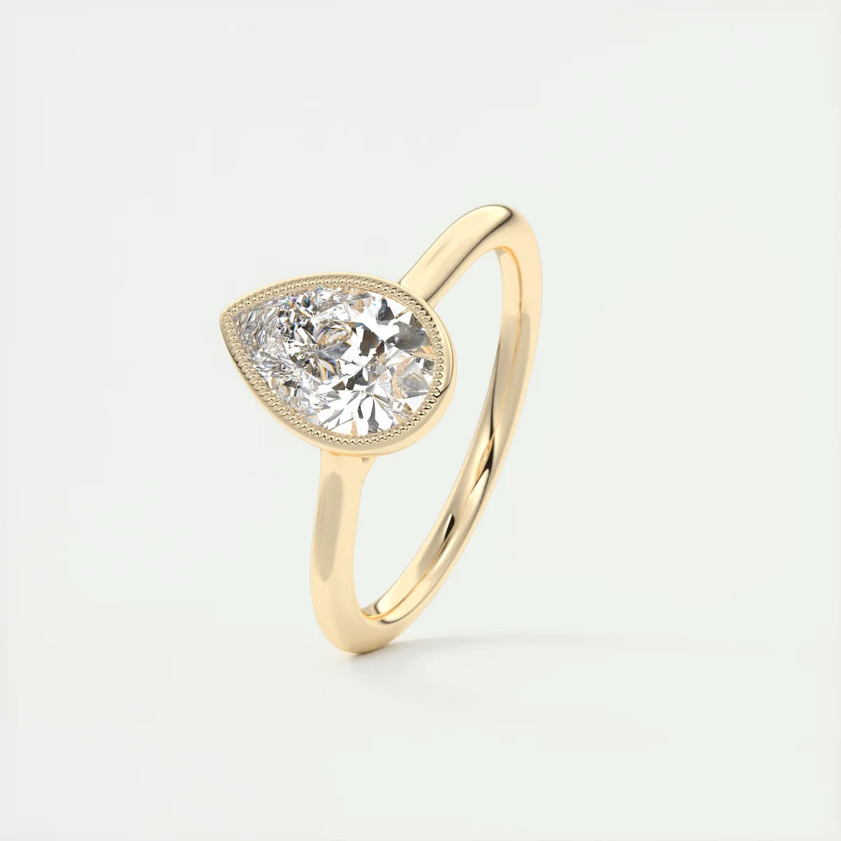 2 Carat Pear Solitaire Textured Bezel