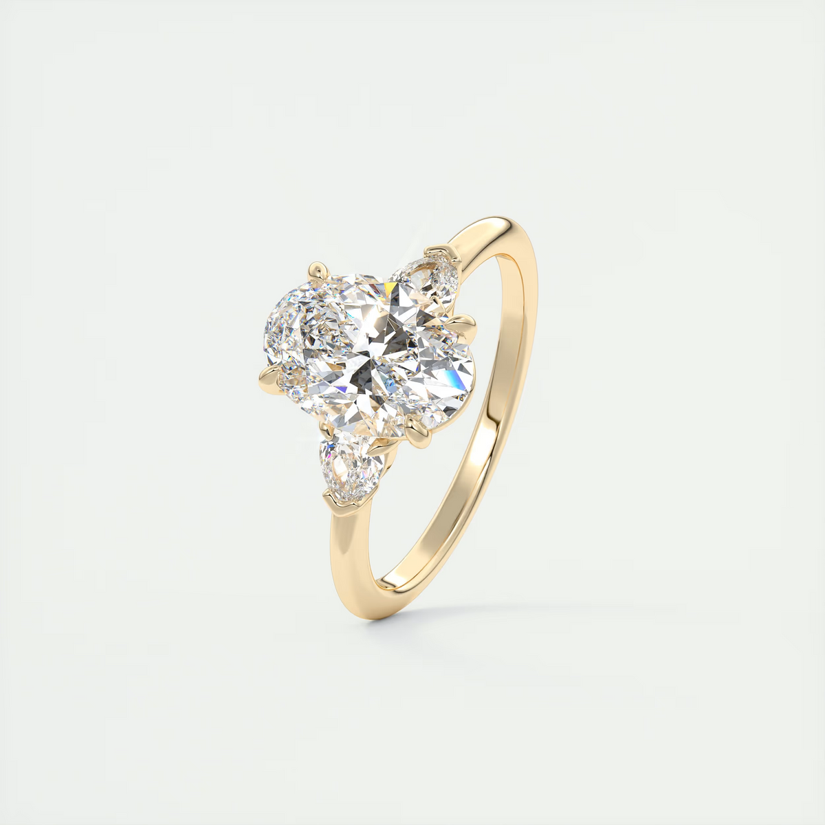 2 Carat Oval Plunge Three-Stone Engagement Ring with Pear Side Stones