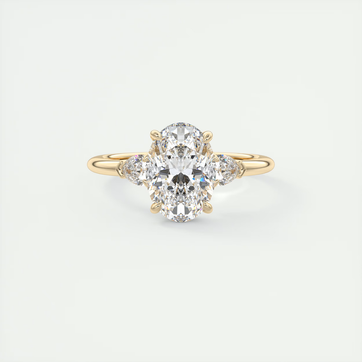 2 Carat Oval Plunge Three-Stone Engagement Ring with Pear Side Stones